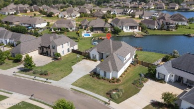 New Waterfront Listing on Camden Lake - Lake CarolineBeautifully on Lake Caroline Golf Club in Mississippi - for sale on GolfHomes.com, golf home, golf lot