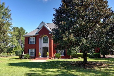 NEW ROOF This lovely two-story brick home is located in The on Highland Oaks Golf Course in Alabama - for sale on GolfHomes.com, golf home, golf lot