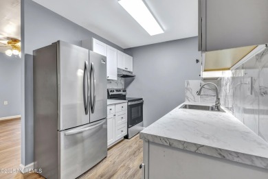 Welcome to this Beautifully Renovated 2 Bedroom 1 Bath End-Unit on Greenbriar Woodlands in New Jersey - for sale on GolfHomes.com, golf home, golf lot
