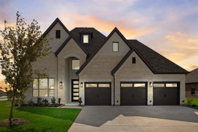 This highly sought-after single-story Altura Aspen floorplan is on Heath Golf and Yacht Club in Texas - for sale on GolfHomes.com, golf home, golf lot
