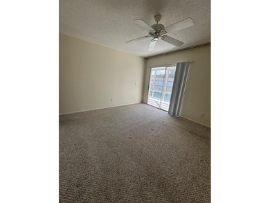 2nd Floor End Unit with Gorgeous, unobstructed Water & Golf on Pine Lakes Golf Club in Florida - for sale on GolfHomes.com, golf home, golf lot