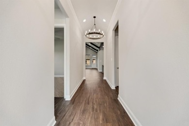 This highly sought-after single-story Altura Aspen floorplan is on Heath Golf and Yacht Club in Texas - for sale on GolfHomes.com, golf home, golf lot