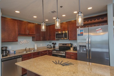 Laketown Wharf #431, a beautifully furnished 3-bedroom, 2-bath on Signal Hill Golf Course, Inc. in Florida - for sale on GolfHomes.com, golf home, golf lot