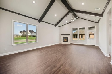 This highly sought-after single-story Altura Aspen floorplan is on Heath Golf and Yacht Club in Texas - for sale on GolfHomes.com, golf home, golf lot