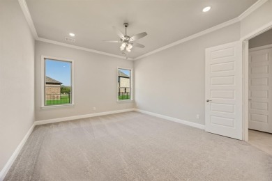 This highly sought-after single-story Altura Aspen floorplan is on Heath Golf and Yacht Club in Texas - for sale on GolfHomes.com, golf home, golf lot