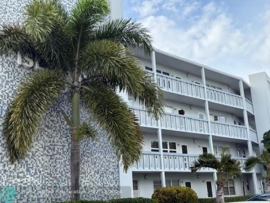 LOOK NO FURTHER , THIS IS IT! WHAT A LAKE VIEW THIS UNIT HAS on Hillsboro Pines Golf in Florida - for sale on GolfHomes.com, golf home, golf lot