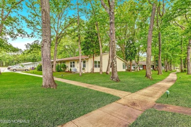 Welcome to this Beautifully Renovated 2 Bedroom 1 Bath End-Unit on Greenbriar Woodlands in New Jersey - for sale on GolfHomes.com, golf home, golf lot