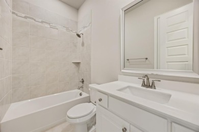 This highly sought-after single-story Altura Aspen floorplan is on Heath Golf and Yacht Club in Texas - for sale on GolfHomes.com, golf home, golf lot
