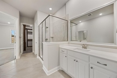 This highly sought-after single-story Altura Aspen floorplan is on Heath Golf and Yacht Club in Texas - for sale on GolfHomes.com, golf home, golf lot