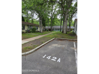 Welcome to this Beautifully Renovated 2 Bedroom 1 Bath End-Unit on Greenbriar Woodlands in New Jersey - for sale on GolfHomes.com, golf home, golf lot