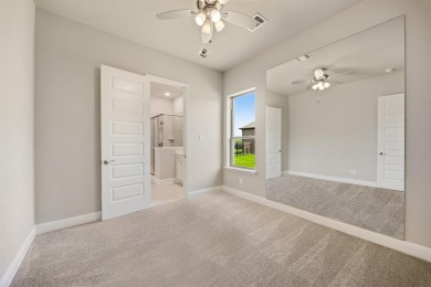 This highly sought-after single-story Altura Aspen floorplan is on Heath Golf and Yacht Club in Texas - for sale on GolfHomes.com, golf home, golf lot