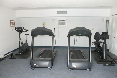 2nd Floor End Unit with Gorgeous, unobstructed Water & Golf on Pine Lakes Golf Club in Florida - for sale on GolfHomes.com, golf home, golf lot