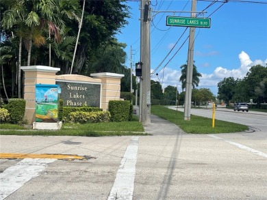 REDUCED TO SELL- LOWEST PRICED 2/1.5 
 Fabulous condo in PHASE on Sunrise Lakes Phase IV Golf Course in Florida - for sale on GolfHomes.com, golf home, golf lot