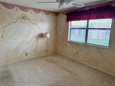 REDUCED TO SELL- LOWEST PRICED 2/1.5 
 Fabulous condo in PHASE on Sunrise Lakes Phase IV Golf Course in Florida - for sale on GolfHomes.com, golf home, golf lot