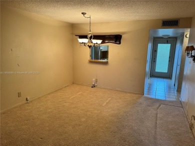 REDUCED TO SELL- LOWEST PRICED 2/1.5 
 Fabulous condo in PHASE on Sunrise Lakes Phase IV Golf Course in Florida - for sale on GolfHomes.com, golf home, golf lot