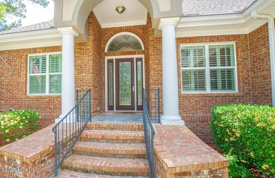 Welcome to your dream home! Nestled in the picturesque community on Ocean Ridge Plantation in North Carolina - for sale on GolfHomes.com, golf home, golf lot