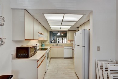 Welcome to your new home in Paradise!  Enjoy peaceful golf on Palm Aire Country Club of Sarasota in Florida - for sale on GolfHomes.com, golf home, golf lot