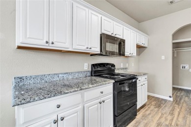 Welcome to this beautifully updated three- bedroom, two -bath on Mansfield National Golf Club in Texas - for sale on GolfHomes.com, golf home, golf lot