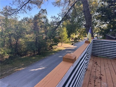 Wanting a get away but not the maintenance? Enjoy Table Rock on Holiday Island Executive Golf Course in Arkansas - for sale on GolfHomes.com, golf home, golf lot