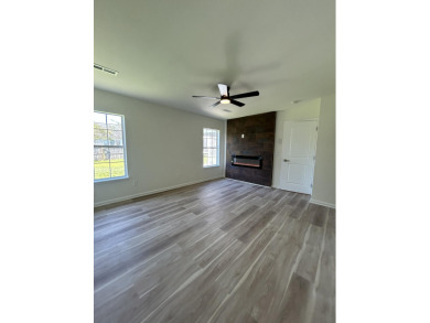 Perfectly positioned on a spacious corner lot in the highly on Golf Club At Wescott Plantation in South Carolina - for sale on GolfHomes.com, golf home, golf lot