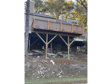 Wanting a get away but not the maintenance? Enjoy Table Rock on Holiday Island Executive Golf Course in Arkansas - for sale on GolfHomes.com, golf home, golf lot
