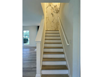 Perfectly positioned on a spacious corner lot in the highly on Golf Club At Wescott Plantation in South Carolina - for sale on GolfHomes.com, golf home, golf lot