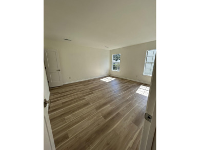 Perfectly positioned on a spacious corner lot in the highly on Golf Club At Wescott Plantation in South Carolina - for sale on GolfHomes.com, golf home, golf lot