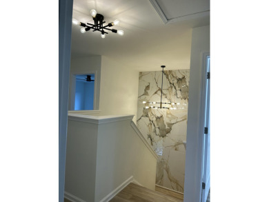 Perfectly positioned on a spacious corner lot in the highly on Golf Club At Wescott Plantation in South Carolina - for sale on GolfHomes.com, golf home, golf lot
