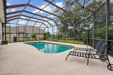 **Seller offering $7,500 in concessions!** *Screened-In Pool on Eagle Harbor Golf Club in Florida - for sale on GolfHomes.com, golf home, golf lot