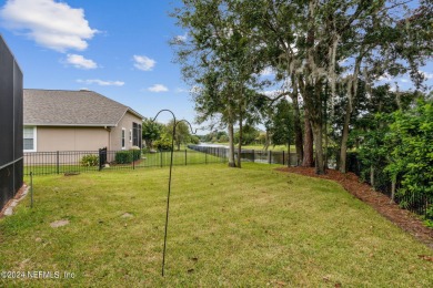 **Seller offering $7,500 in concessions!** *Screened-In Pool on Eagle Harbor Golf Club in Florida - for sale on GolfHomes.com, golf home, golf lot