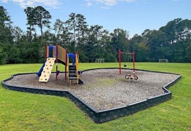 Perfectly positioned on a spacious corner lot in the highly on Golf Club At Wescott Plantation in South Carolina - for sale on GolfHomes.com, golf home, golf lot