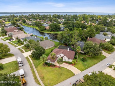 **Seller offering $7,500 in concessions!** *Screened-In Pool on Eagle Harbor Golf Club in Florida - for sale on GolfHomes.com, golf home, golf lot