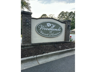 Perfectly positioned on a spacious corner lot in the highly on Golf Club At Wescott Plantation in South Carolina - for sale on GolfHomes.com, golf home, golf lot