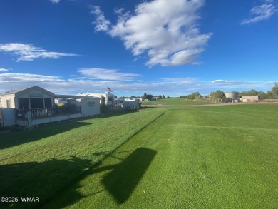 Location at it's BEST! Enjoy the large deck over looking the on Juniper Ridge R.V. Golf Resort in Arizona - for sale on GolfHomes.com, golf home, golf lot