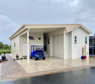 A newer, larger park model on the fairway? Yes! This 2019 park on Juniper Ridge R.V. Golf Resort in Arizona - for sale on GolfHomes.com, golf home, golf lot