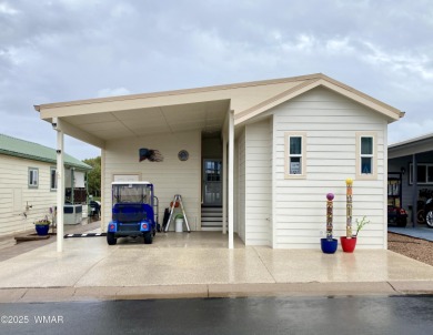 A newer, larger park model on the fairway? Yes! This 2019 park on Juniper Ridge R.V. Golf Resort in Arizona - for sale on GolfHomes.com, golf home, golf lot
