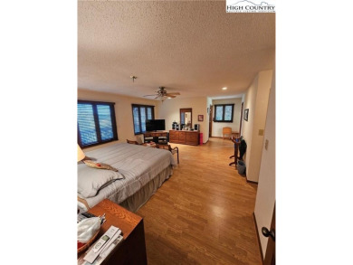 Welcome to this 3-bedroom, 3-bath mountain home with bonus room on Beech Mountain Club in North Carolina - for sale on GolfHomes.com, golf home, golf lot