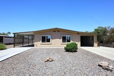Located in the active adult community of Sun Lakes, Arizona on Sun Lakes Country Club in Arizona - for sale on GolfHomes.com, golf home, golf lot