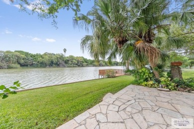 Absolutely gorgeous home with an amazing view to the resaca from on Rancho Viejo Resort and Country Club in Texas - for sale on GolfHomes.com, golf home, golf lot