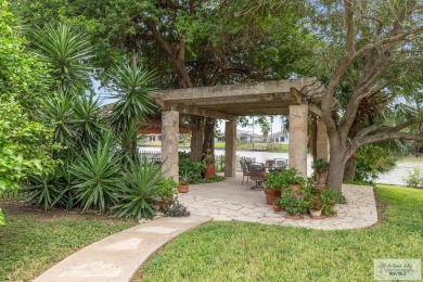 Absolutely gorgeous home with an amazing view to the resaca from on Rancho Viejo Resort and Country Club in Texas - for sale on GolfHomes.com, golf home, golf lot