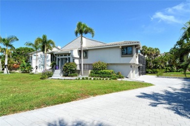 Welcome to this elevated retreat in the sought-after Bayou on Longboat Key Golf Club Resort in Florida - for sale on GolfHomes.com, golf home, golf lot