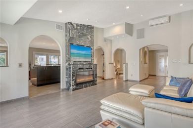 Welcome to this elevated retreat in the sought-after Bayou on Longboat Key Golf Club Resort in Florida - for sale on GolfHomes.com, golf home, golf lot