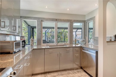 Welcome to this elevated retreat in the sought-after Bayou on Longboat Key Golf Club Resort in Florida - for sale on GolfHomes.com, golf home, golf lot