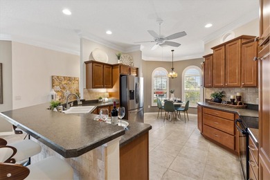 Move-In Ready DESIGNER GARDENIA on a PREMIUM CORNER LOT Ideally on Egret Championship Golf Course in Florida - for sale on GolfHomes.com, golf home, golf lot