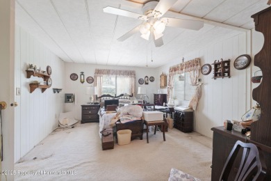 This 2 bedroom, 2 bath home with a covered carport wraps you in on High Point Golf Club, Inc. in Florida - for sale on GolfHomes.com, golf home, golf lot