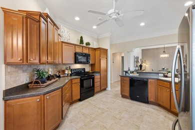 Move-In Ready DESIGNER GARDENIA on a PREMIUM CORNER LOT Ideally on Egret Championship Golf Course in Florida - for sale on GolfHomes.com, golf home, golf lot