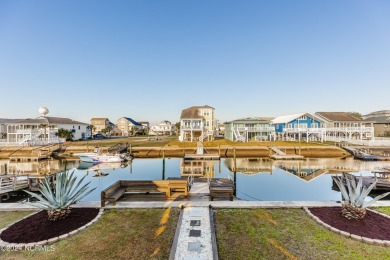 Canal front! Completely furnished and move in ready. Fall in on Sea Trail Golf Resort in North Carolina - for sale on GolfHomes.com, golf home, golf lot