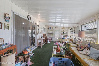 This 2 bedroom, 2 bath home with a covered carport wraps you in on High Point Golf Club, Inc. in Florida - for sale on GolfHomes.com, golf home, golf lot