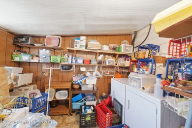 This 2 bedroom, 2 bath home with a covered carport wraps you in on High Point Golf Club, Inc. in Florida - for sale on GolfHomes.com, golf home, golf lot