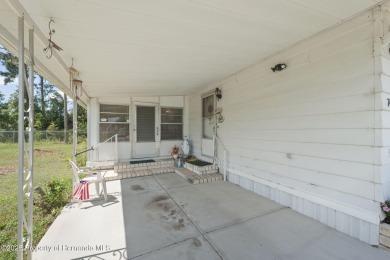 This 2 bedroom, 2 bath home with a covered carport wraps you in on High Point Golf Club, Inc. in Florida - for sale on GolfHomes.com, golf home, golf lot
